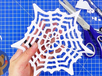 Sněhová vločka z papíru jako pavoučí síť - zimní dekorace - DIY pro děti